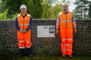 Gallery of pictures showing the installation of the first sign in Station Road