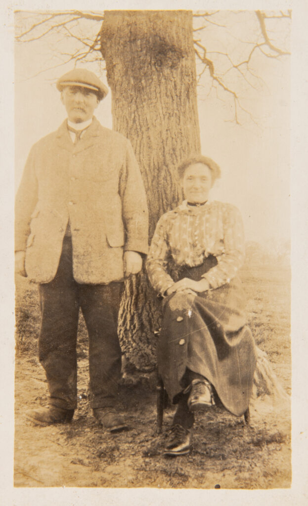Older Couple siiting under a tree