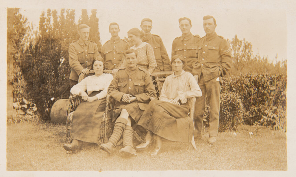 Group of ladies with WW1 Soldiers