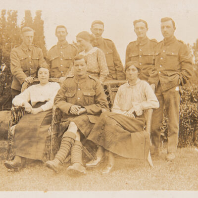 Group of ladies with WW1 Soldiers