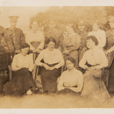 Group of ladies with WW1 Soldiers