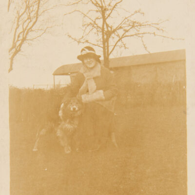 Lady with Dog in a field