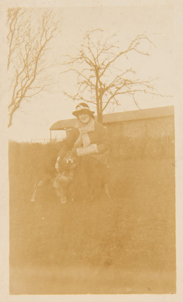 Lady with Dog in a field