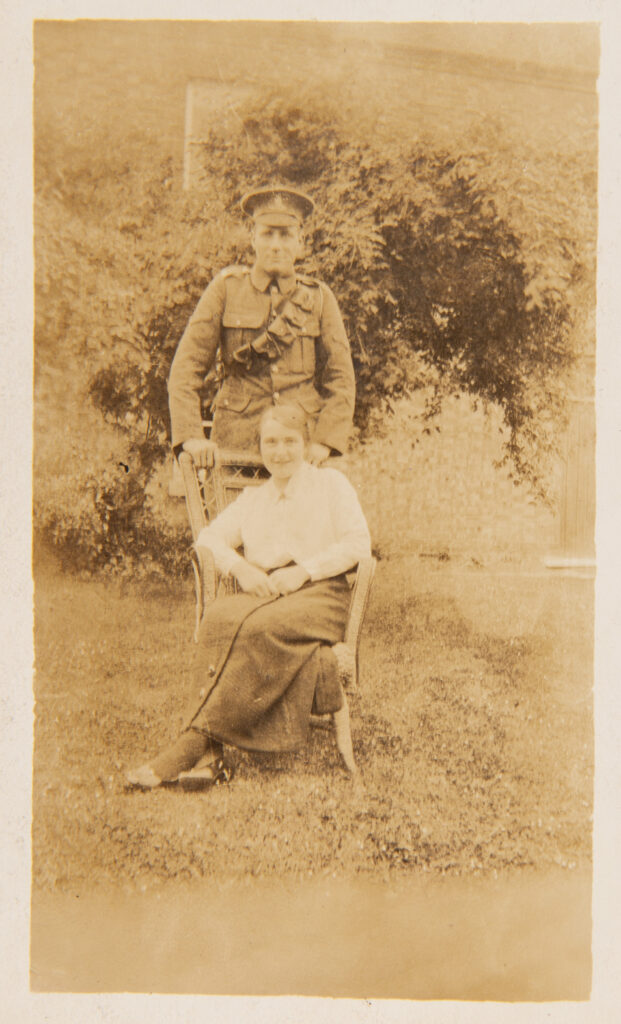 Soldier with Lady sitting on Chair