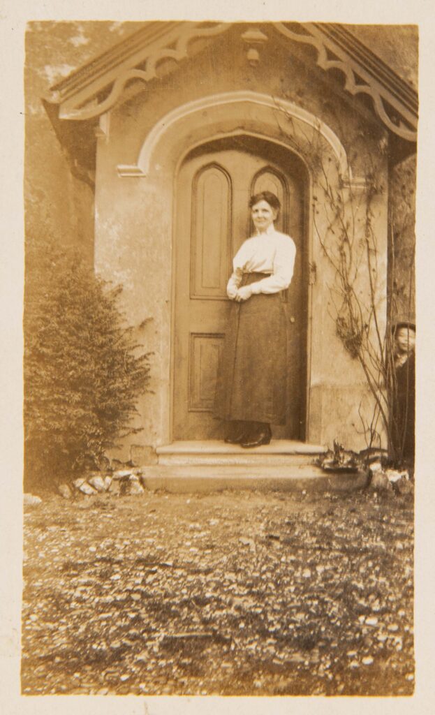 Lady standing by front door