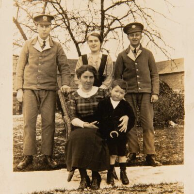 Family in garden with Soldiers