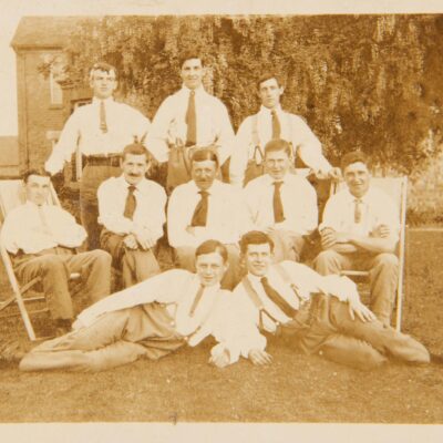 Group of Soldiers at rest sitting outside