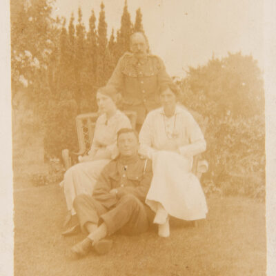 Soldiers and Ladies sitting in the garden