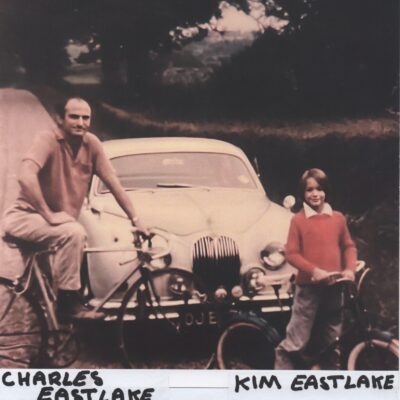 Charles and Kim East Lake with Bikes in front of Jaguar Car